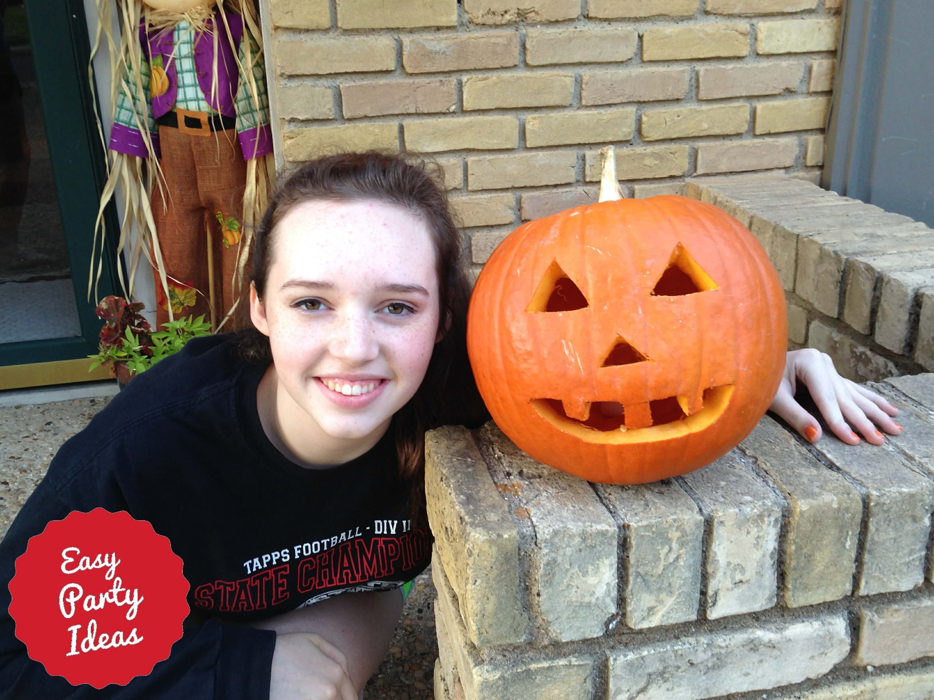 Teen with pumpkin