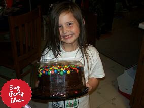Girl Holding Cake